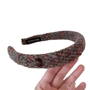 Elegant grey tweed braided headband with handmade label and bow accent