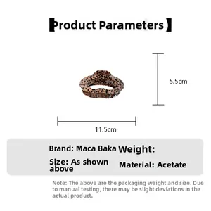 Detail view of acetate leopard print hair claw clip showing 11.5cm by 5.5cm dimensions