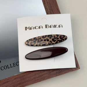 Set of two vintage resin hair clips in leopard print and dark brown glossy finish