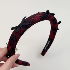 Retro red plaid headband with black bows and handmade label in academy style
