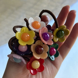 Bunte Blumen-Haargummis-Set aus glänzendem Kunststoff mit hochelastischen Gummibändern