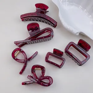 Five-piece set of wine red polka dot resin hair claw clips with various geometric shapes