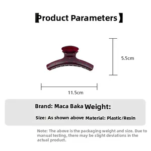 Detailed size view of the 11.5cm dark red hair claw clip with polka dot texture