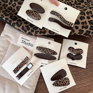 Brown leopard print hair clip set with heart and geometric resin patterns for women