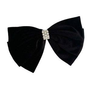 Elegant large black velvet bow hair clip with decorative pearls for a vintage french look