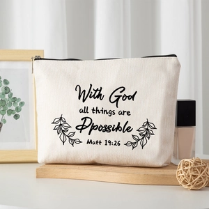 Linen makeup bag with With God all things are possible lettering and black zipper closure