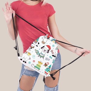 Detail of Christmas alpaca drawstring backpack with durable black cotton cords and festive print