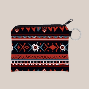 Detail of Aztec pattern coin purse with black zipper and silver keyring attachment