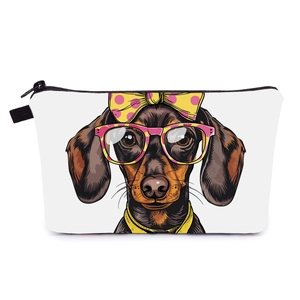 Detail of dachshund printed makeup bag showing canvas texture and zip closure