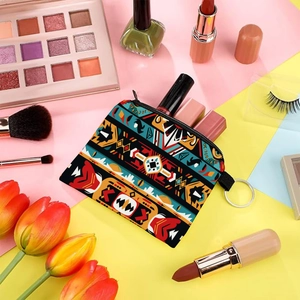 Aztec print coin purse with metal keychain ring and zipper closure for storage