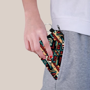 Aztec print triangle coin purse with tribal geometric pattern and metal keychain hook