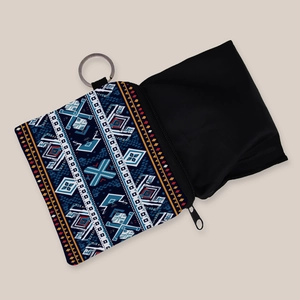 Aztec print coin purse with blue geometric patterns and metal keychain ring