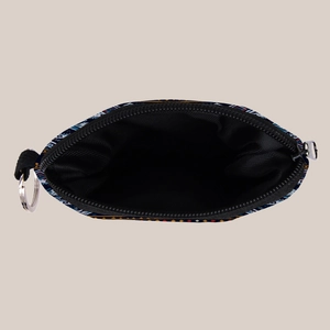Aztec tribal pattern coin purse interior with black lining and secure metal keychain ring