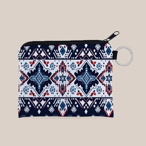 Detail of Aztec geometric print coin purse with zipper and metal keychain ring