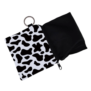 Portable cow print coin purse with zipper closure and metal keychain ring for women