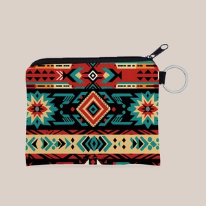 Detailed macro shot of Aztec geometric pattern on portable coin purse keychain