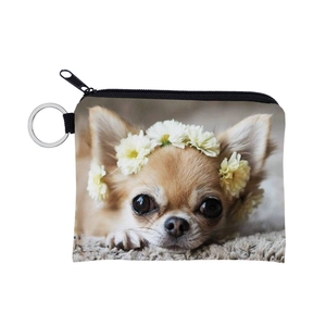 Close-up of portable coin purse featuring Chihuahua print with flower crown and key ring