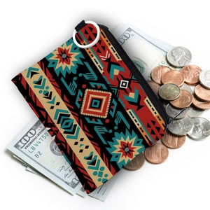 Detail of Aztec print coin purse showing capacity for folded bills and loose change