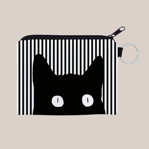 Detail of striped coin purse featuring a black cat print and silver metal keychain ring