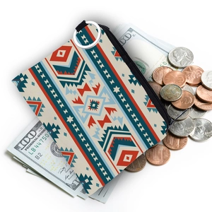 Aztec print coin purse with silver keychain ring shown holding cash and coins