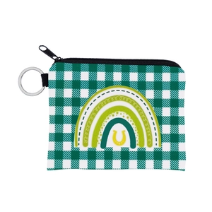 Detail of St. Patrick’s Day coin purse with green gingham, rainbow print, and key ring