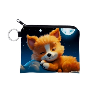 Close-up of a blue zip coin purse with a cute fox print and silver metal keyring