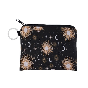 Black canvas coin purse with celestial star and moon patterns and silver keychain ring