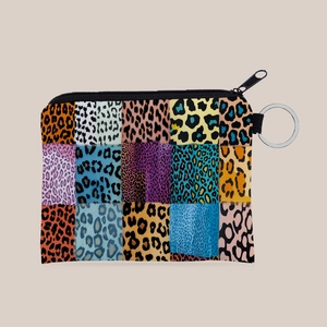 Flat lay of colorful leopard print coin purse with a silver metal keychain ring
