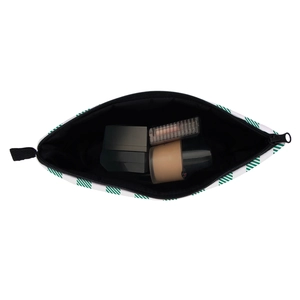 Top view of St. Patrick's Day makeup bag with green stripes showing internal storage space