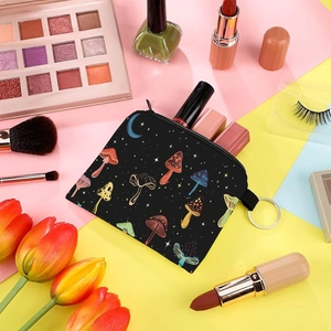 Close-up of colorful mushroom print pouch with cosmetics and zipper detail