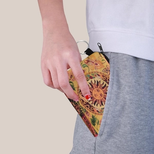 Portable floral sun pattern coin purse with metal keychain and secure zipper closure