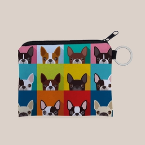 Detail view of square coin purse with colorful dog prints and metal keychain ring