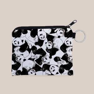 Close-up of fabric coin purse with panda prints and functional metal keychain ring