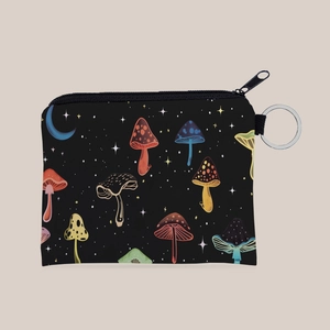 Detail of mushroom print coin purse with black metal zipper and silver keyring