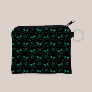 Detail view of the durable canvas fabric and smooth black zipper on the alien coin purse