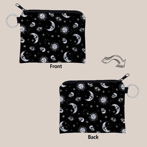 Front and back detail of black sun and moon print coin pouch with metal keychain