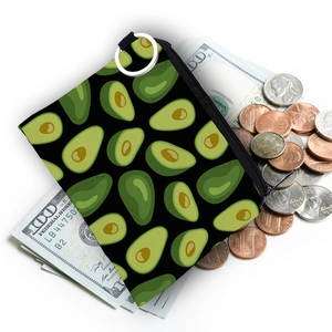 Miniature fabric coin purse with avocado print and silver keychain ring on white background