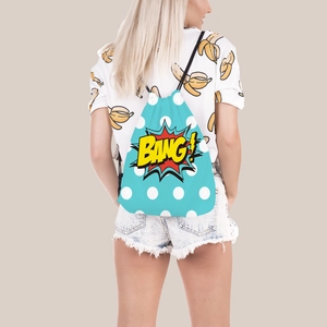 Blue polka dot drawstring backpack with pop art BANG! print and black shoulder straps