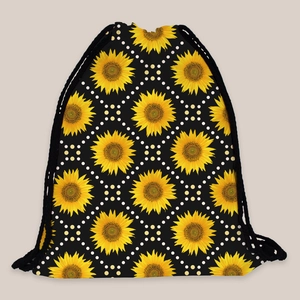 Close-up of sunflower print and white polka dots on lightweight drawstring backpack fabric