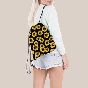 Lightweight black drawstring backpack featuring a vibrant yellow sunflower floral pattern