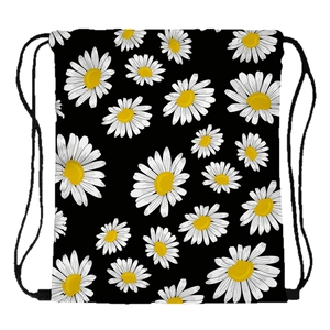 Black drawstring backpack featuring vibrant white and yellow sunflower daisy floral print
