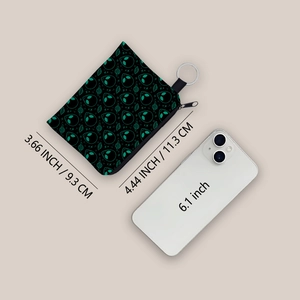 Portable alien print coin purse with keychain and zipper closure, cosmic space theme