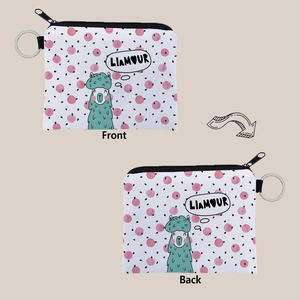 Front and back detail of a canvas coin purse with cute alpaca print and metal keychain