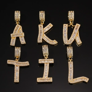 Hip-hop style gold plated baguette zircon initial pendants on reflective black background