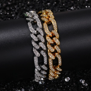 Detailed view of hip hop Cuban link necklaces in gold and silver finish with rhinestones