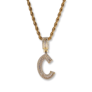 Iced out gold letter C pendant necklace with zircon stones on a classic rope chain
