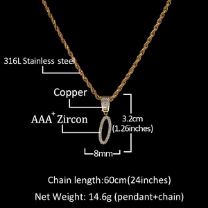 Detail of gold cursive letter O pendant featuring AAA+ cubic zirconia and copper base