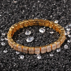 Luxurious gold-plated hip hop bracelet featuring baguette-cut and pave-set zircons