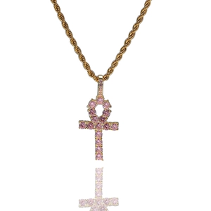 Detail of pink zircon-encrusted Ankh cross pendant with gold-plated hip-hop rope chain
