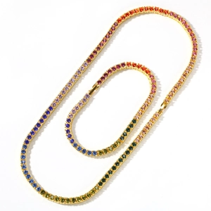 Detail of multi-color rainbow tennis bracelet and necklace with gold plated chain and clasp